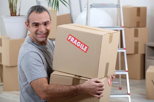 Man With Van Colyers team preparing items safely for transport