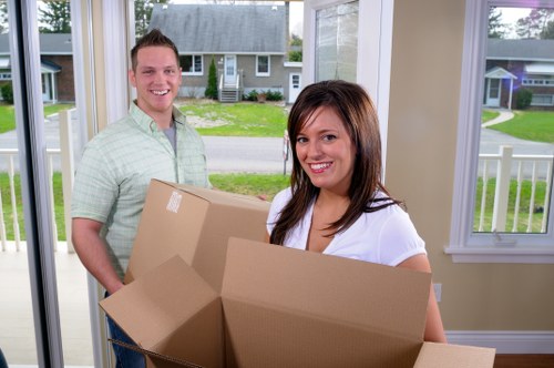 Office relocation planning in Colyers with moving boxes and business furniture