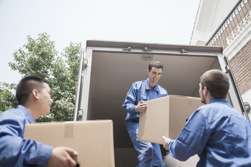 Careful furniture loading for a home removal in Colyers