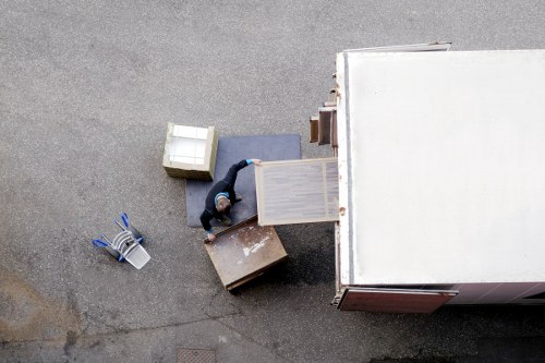Commercial moving team preparing office equipment in Colyers
