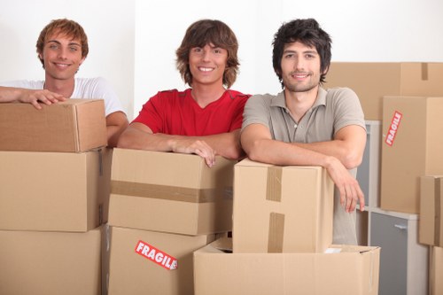 Moving van and packed boxes ready for a Colyers relocation