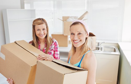 Loading furniture and boxes into a removal van for a Colyers move