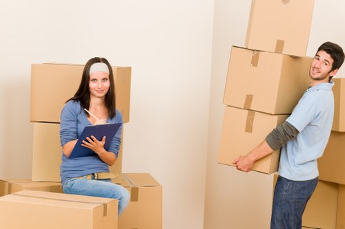 Local movers handling office desks and equipment for a Colyers business move