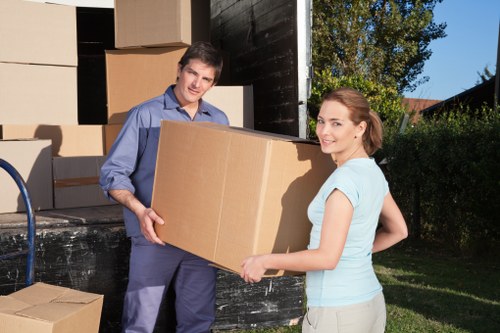 Local removals team handling furniture and boxes in Colyers